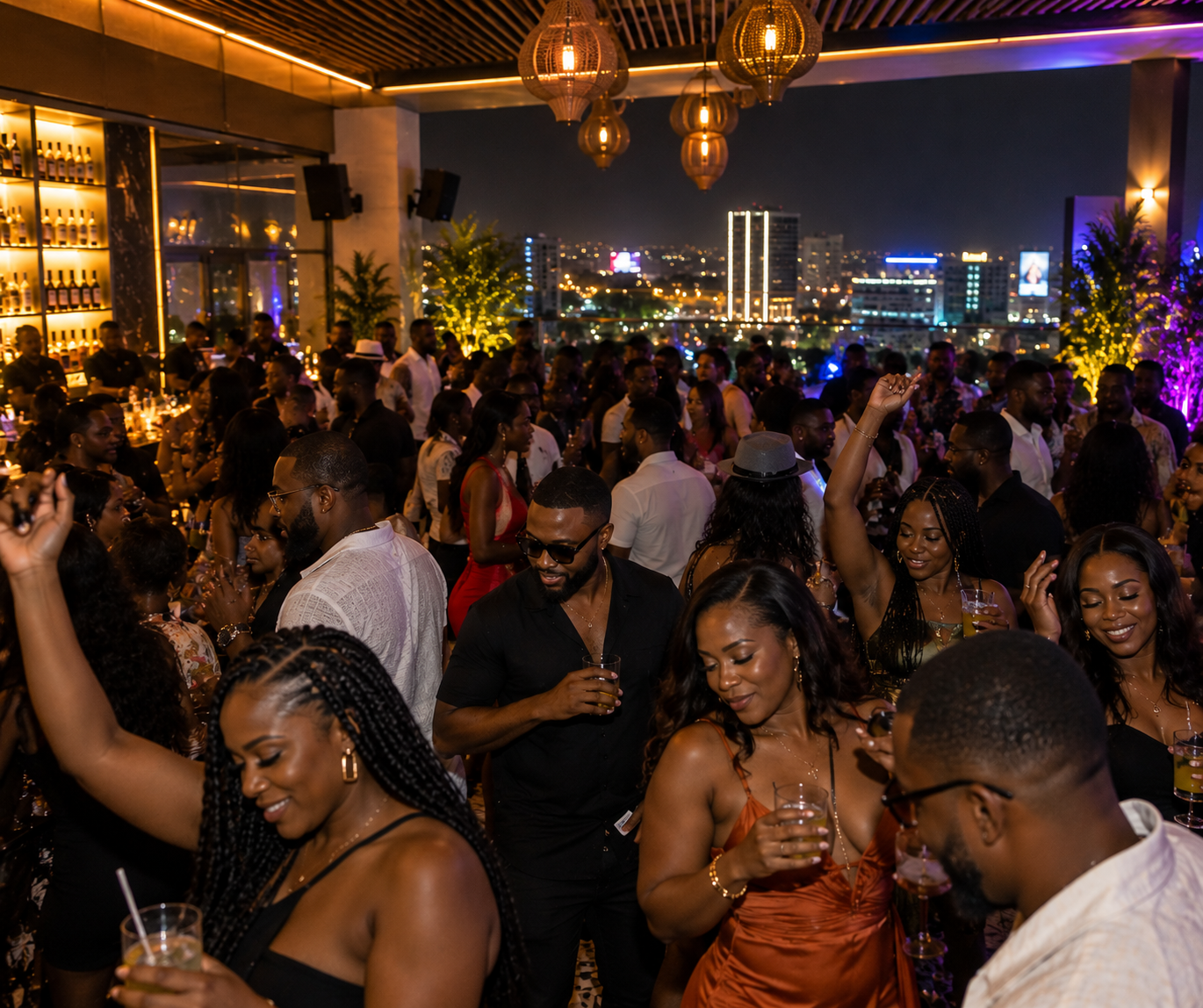 Lively rooftop New Year's Eve celebration with people dancing and enjoying drinks in Accra, Ghana